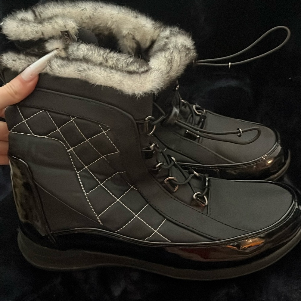 Black and white fur boots